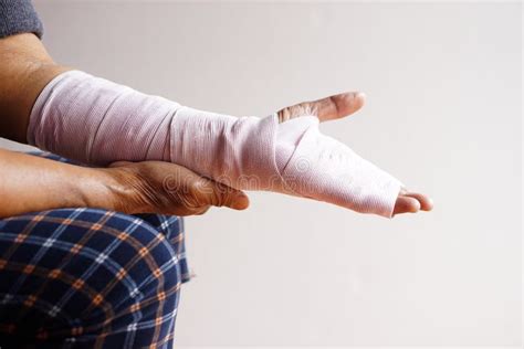 Hand Wrapped with Bandage on Sprain Wrist, Injury Arm Treatment. Stock ...