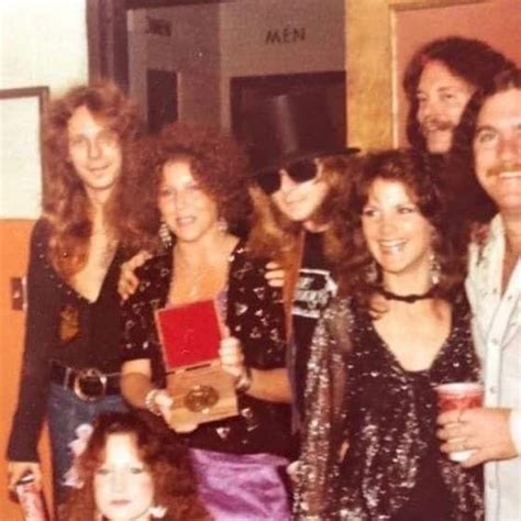 Lynyrd Skynyrd members pose for a photo with the "Public Service Award ...