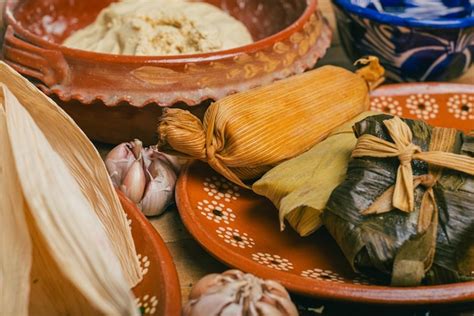 Premium Photo | Tamales and the ingredients used to prepare them ...