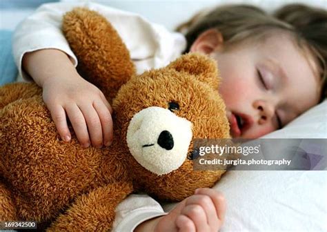 1,351 Kid Sleeping Teddy Bear Stock Photos, High-Res Pictures, and ...