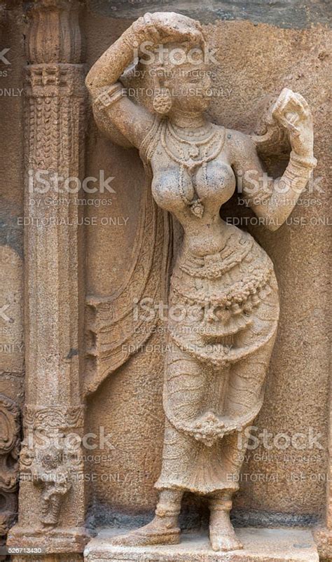statue   absorbed woman  shirangam temple stock photo