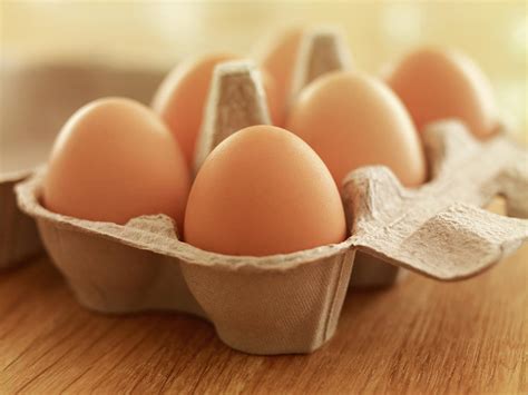 Close Up Of Brown Eggs In Carton by Adam Gault