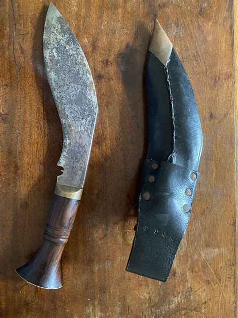 Anyone know anything about this Kukri? Is it possible to work out model ...