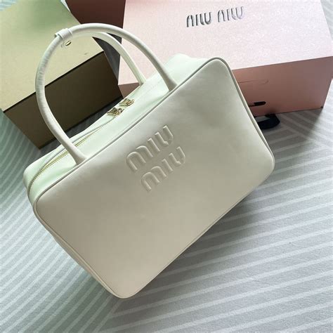 Сумка Miu Miu "Арабески" морей - купить с доставкой по выгодным ценам в ...