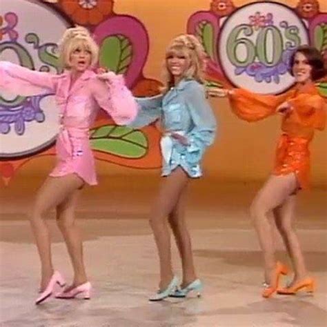 Goldie Hawn, Nancy Sinatra, and Ruth Buzzi on the “Rowan and Martin’s Laugh-In” television show ...