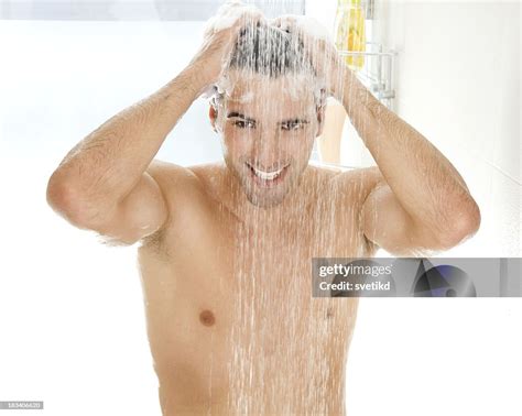 young handsome men   shower high res stock photo getty images