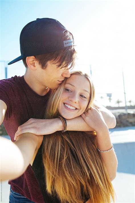 "Teenage Couple In Love Making A Selfie In Summer." by Stocksy