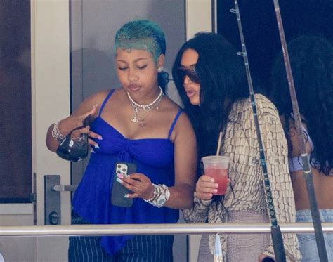 Kim Kardashian Makes Waves in Acne Snake Print Top and Skims Crocodile