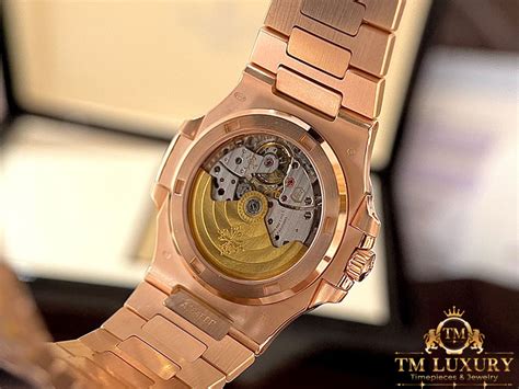 Đồng Hồ Patek Philippe Nautilus 5723/112R Bọc Vàng Kim Moiss Baguette