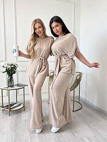 Женские костюмы: купить женский костюм