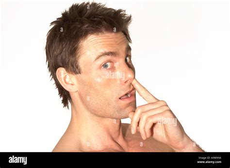 man picking his nose Stock Photo - Alamy