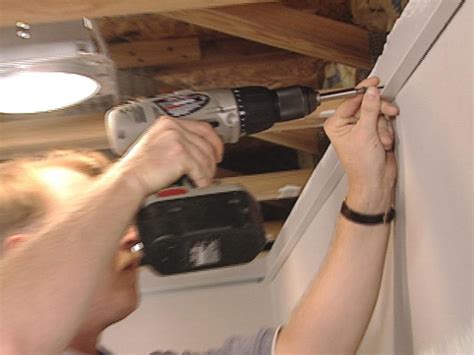 How to Install an Acoustic Drop Ceiling | how-tos | DIY