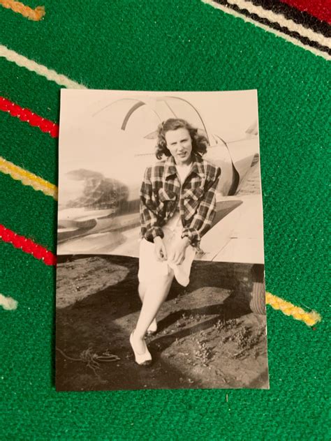 Can someone help ID this plane? It’s my Grandma sitting on a wing of