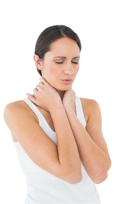 Premium Photo | Closeup of a casual woman suffering from neck ache