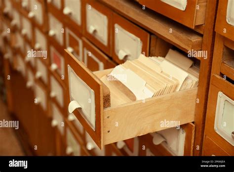 Closeup view of library card catalog drawers Stock Photo - Alamy