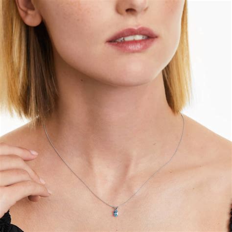14K White Gold Oval Blue Topaz Birthstone Necklace-8341412w14