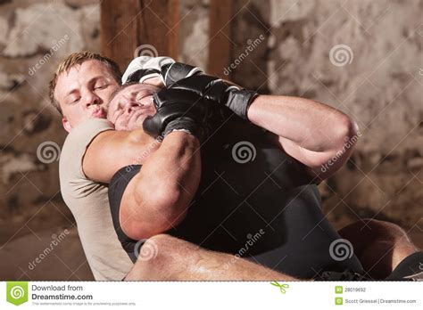 Man in Rear Choke Hold stock photo. Image of choking - 28019692