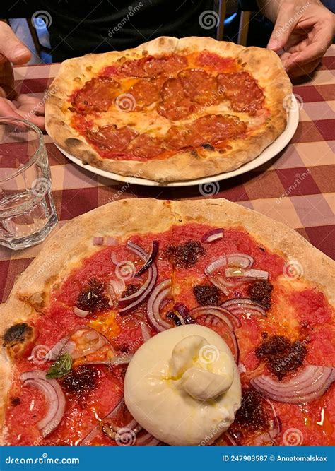 Italian Pizzeria, Pizzas in Two Flavors on the Table, Pizza with Bufala