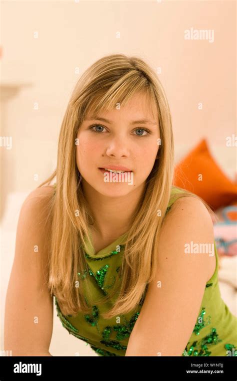 Teenage girl (14-16) smiling, portait Stock Photo - Alamy