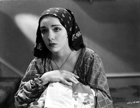 Lupe Velez Posed in Checkered Dress with Black Scarf on Her Head Photo