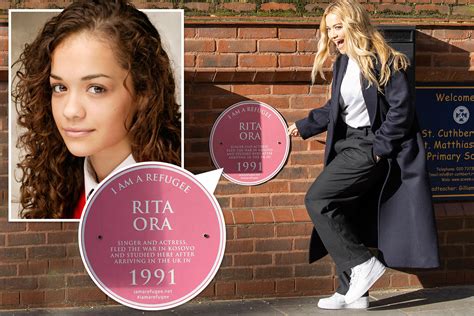 Rita Ora is all smiles as she poses next to plaque in her honour at her ...