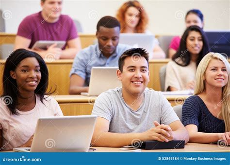 students  laptops  digital tablets  lecture stock photo