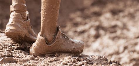 Mud Race Runner Very Muddy Running Shoes Stock Photo - Image of legs ...