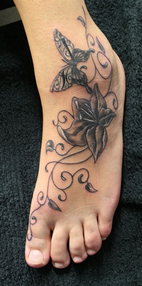 Flower Tattoos On The Foot at Michelle Ma blog