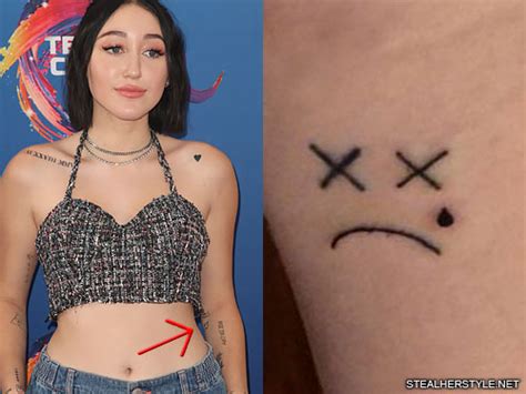 Noah Cyrus Smiley Face, Teardrop Elbow Tattoo | Steal Her Style