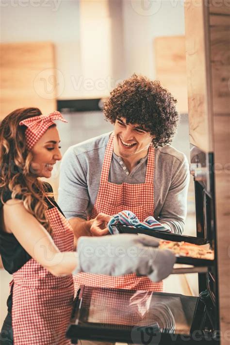 Teamwork In The Kitchen 13877221 Stock Photo at Vecteezy