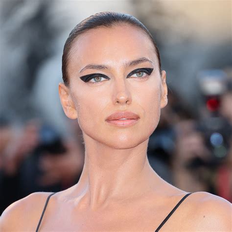 Irina Shayk Teams Black Swimwear With Edgy Platform Boots And A Choker