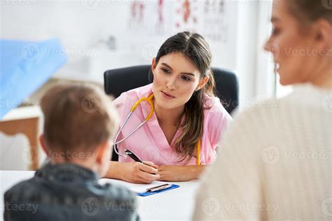 Little boy having medical examination by pediatrician 15875800 Stock ...