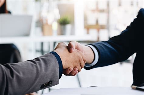 Handshaking Stock Photos, Images and Backgrounds for Free Download