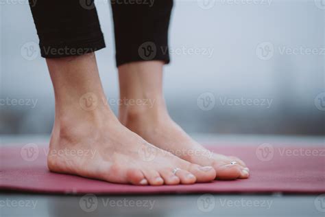 Close up detail of womans feet during yoga exercise. 11746436 Stock
