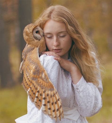 Russian Photographer Takes Images with Real Animals