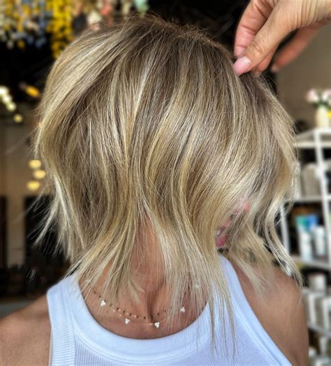 This video shows an inverted bob layered transformation 15