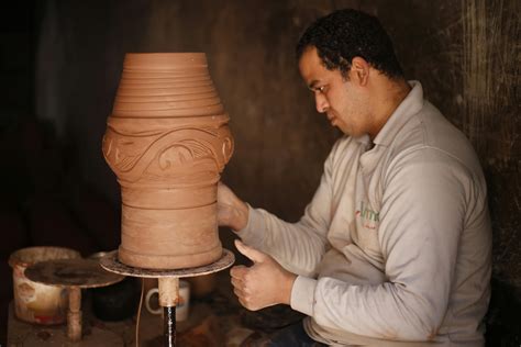 Person Making Clay Pot · Free Stock Photo