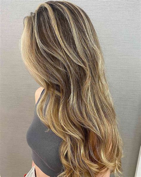 Clients are debating if honey highlights look good on brunettes