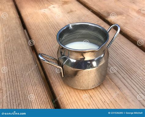 Milk Container In Aluminum On A Black Background Stock Image ...