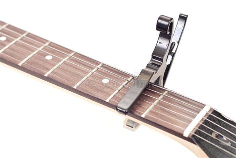 Gitaar Capo stock afbeelding. Image of riem, baas, muziek - 16354721