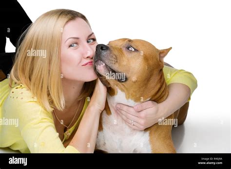 Girl hugging dog Stock Photo - Alamy