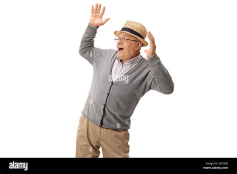 Elderly man being scared by something isolated on white background Stock Photo - Alamy