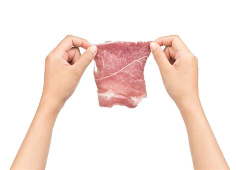 premium photo hand hold fresh meat isolated  white background