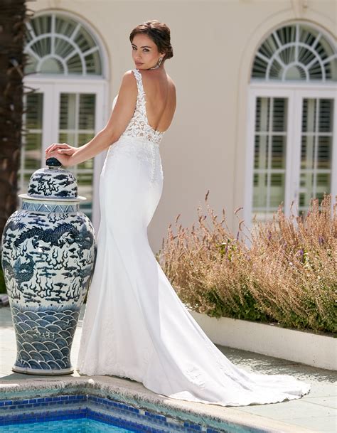 Taron a sheath of lace and crepe with cut-out details | wed2b