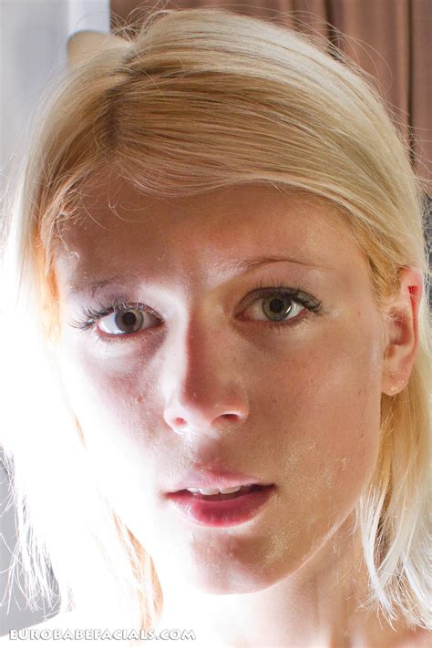 Young female model posing with semen on her face - Ultra High-Quality