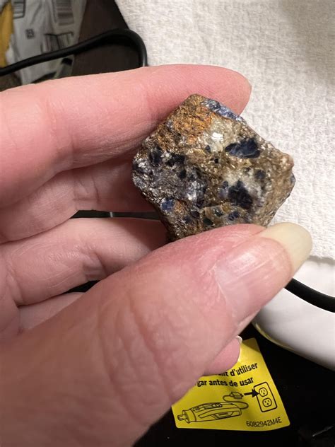 Blue and yellow crystal in rusty matrix : r/whatsthisrock
