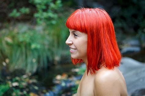 Attractive Red Hair Girl Without Clothes In The Nature Background And ...