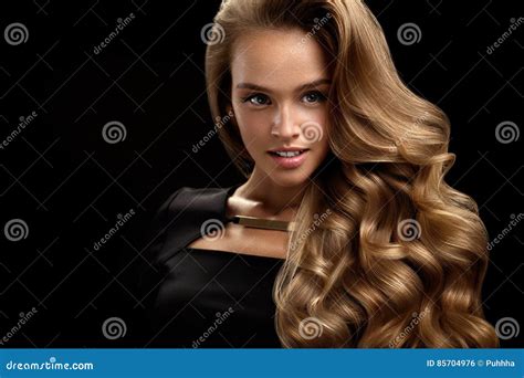 Beautiful Curly Hair. Female Beauty Model with Volume Hair Stock Photo ...