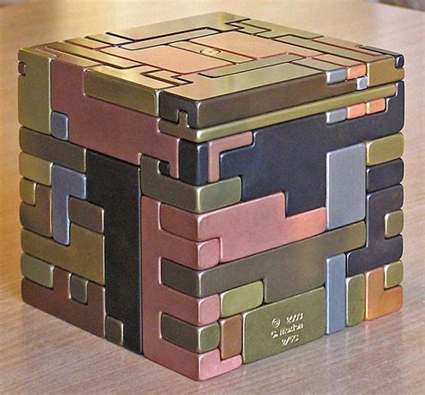 5" sq all metal puzzle. Pieces must be slid in a special sequence ...