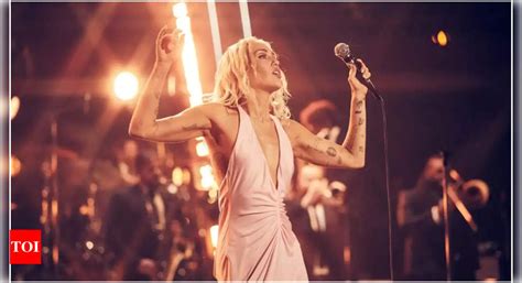 Miley Cyrus to Perform 'Flowers' at Grammy Awards | - Times of India